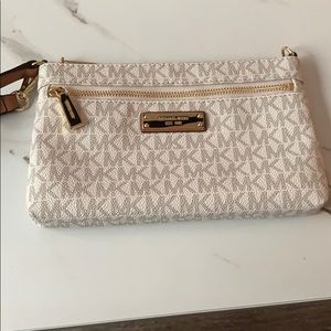 Michael Kors cream colored wristlet